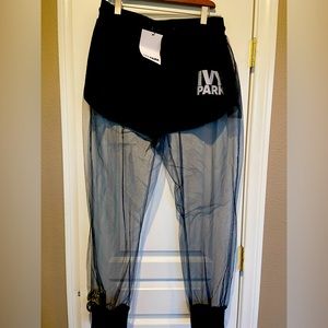 Ivy Park NWT black mesh / sheer pants with built in shorts.
